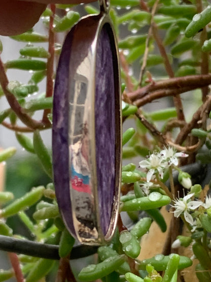 Charoite, magnificent 925 Silver pendant measuring 50mm high x 19mm wide x 9mm thick. Sold with an adjustable black cord!