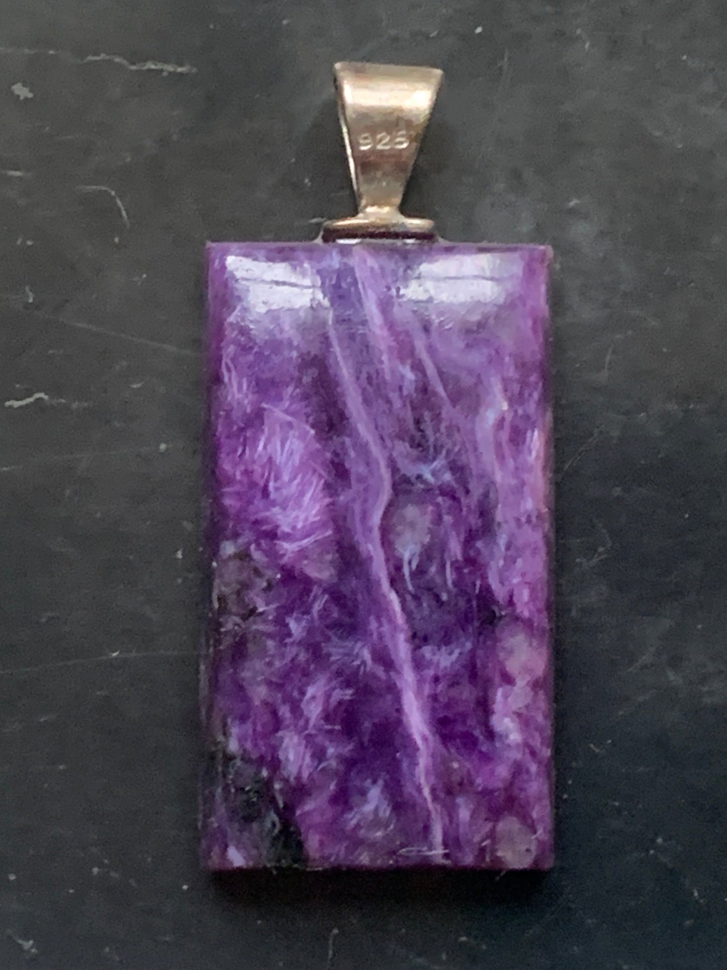 Charoite, magnificent pendant in 925 Silver, 37mm high x 16 wide x 7 thick. Sold with an adjustable black cord!