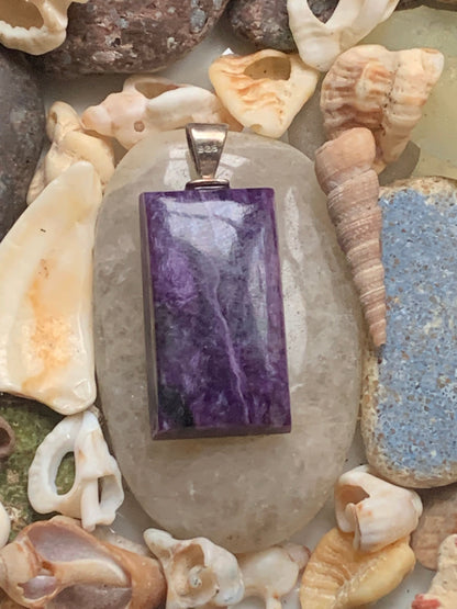 Charoite, magnificent pendant in 925 Silver, 37mm high x 16 wide x 7 thick. Sold with an adjustable black cord!