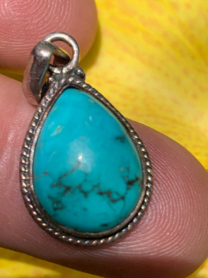 Turquoise Perse ! Pendentif en Argent 925 de 30mm de hauteur x 15 de largeur x 8 d'épaisseur. Vendu avec cordon réglable de couleur noire !