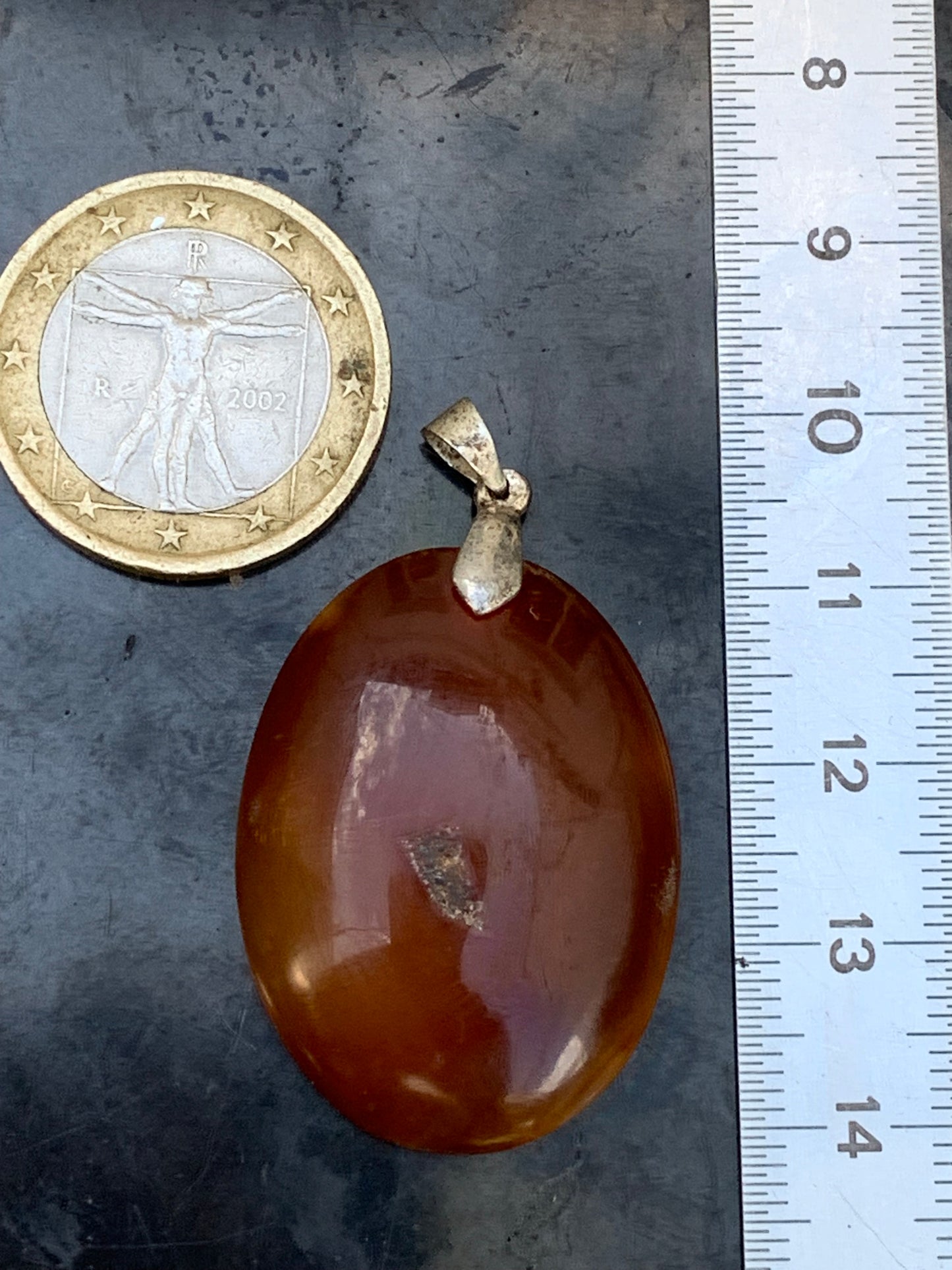 Carnelian, pendant measuring 42mm high x 25mm wide x 8mm thick. Sold with an adjustable black cord!