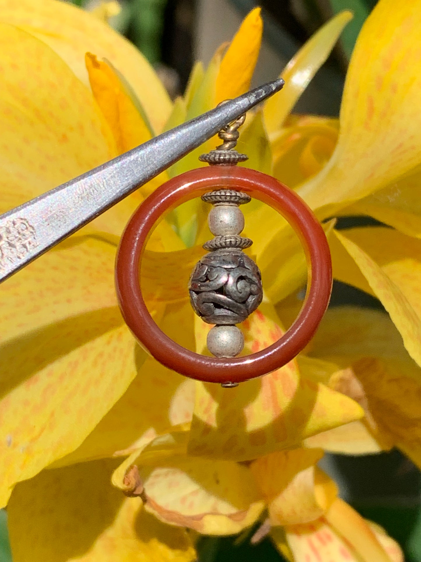 Carnelian pendant made by Gem &amp; Zen, 32mm high x 24mm wide x 8mm thick. Sold with adjustable black cord!