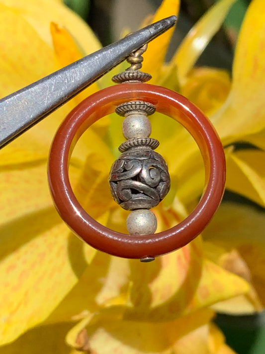 Carnelian pendant made by Gem &amp; Zen, 32mm high x 24mm wide x 8mm thick. Sold with adjustable black cord!