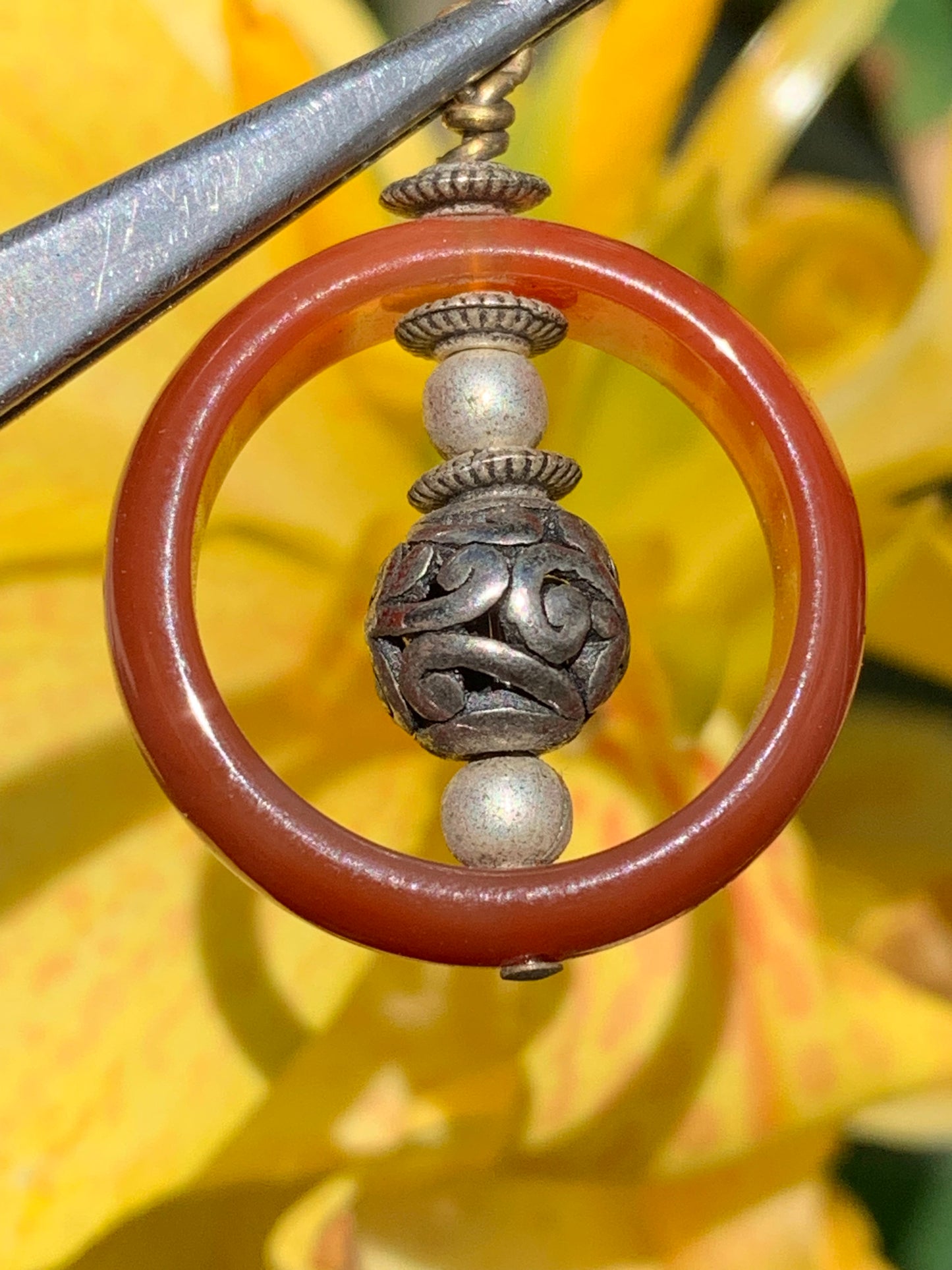 Carnelian pendant made by Gem &amp; Zen, 32mm high x 24mm wide x 8mm thick. Sold with adjustable black cord!