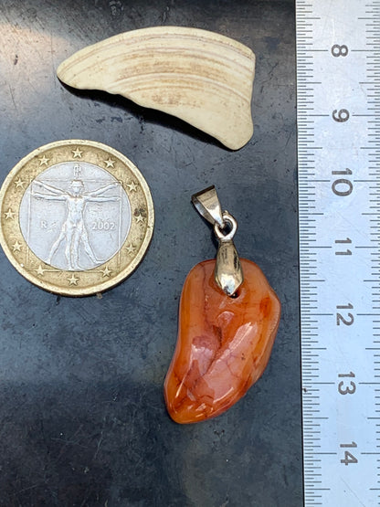 Carnelian pendant made by Gem &amp; Zen, 35mm high x 14mm wide x 10mm thick. Sold with adjustable black cord!