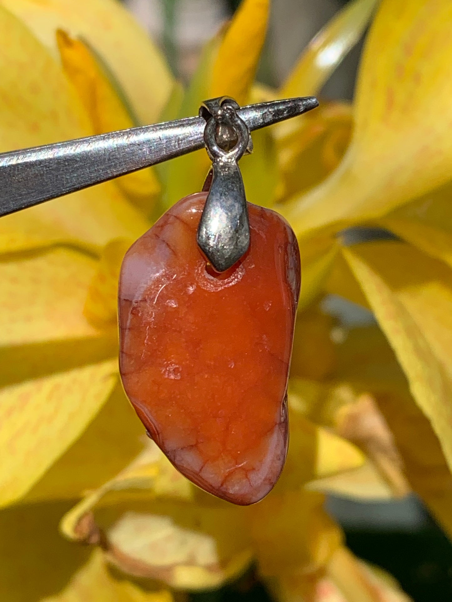 Carnelian pendant made by Gem &amp; Zen, 35mm high x 14mm wide x 10mm thick. Sold with adjustable black cord!