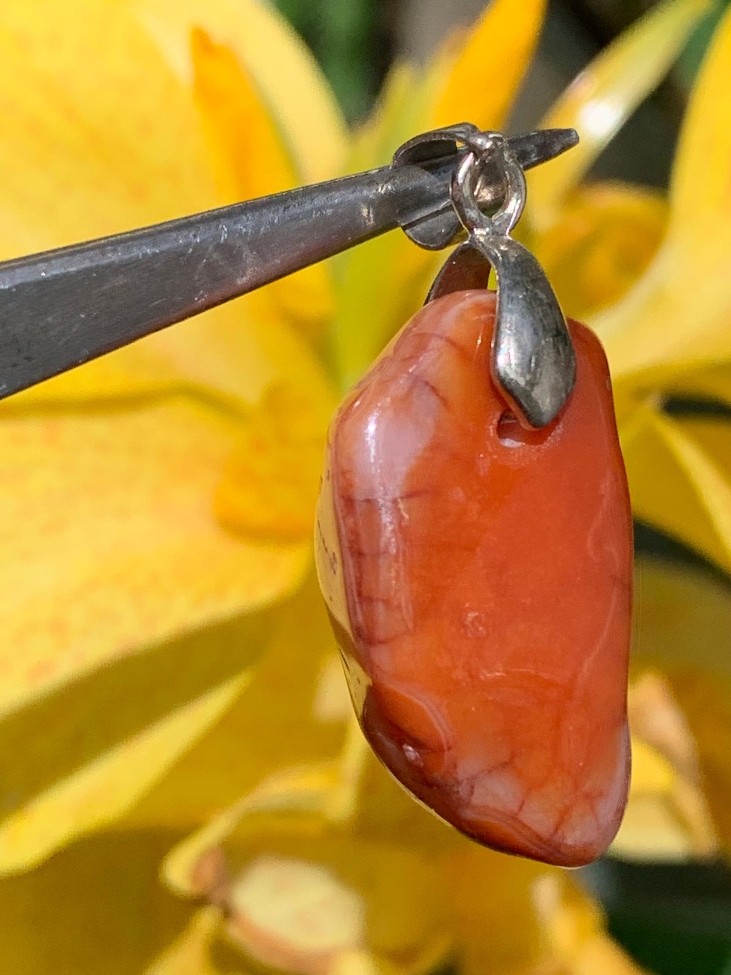 Carnelian pendant made by Gem &amp; Zen, 35mm high x 14mm wide x 10mm thick. Sold with adjustable black cord!