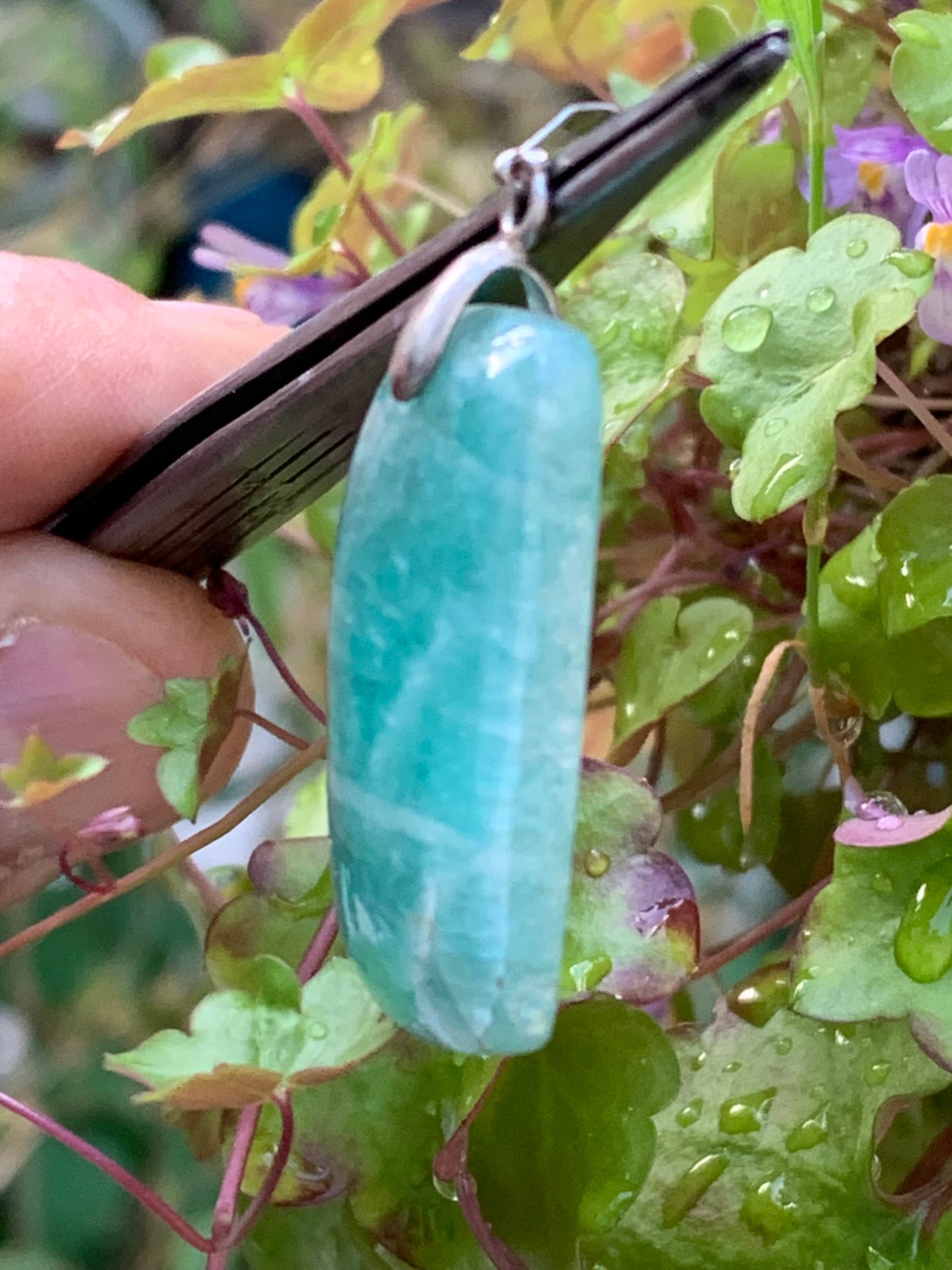 Amazonite, pendant measuring 42mm high x 18mm wide x 8mm thick. Sold with a free adjustable black cord!