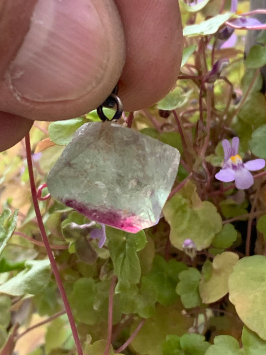 Multicolored Fluorite mounted on 925 Silver, natural octahedron crystal type specimen, size 20 millimeters x 20 x 20. Sold with an adjustable black cord!