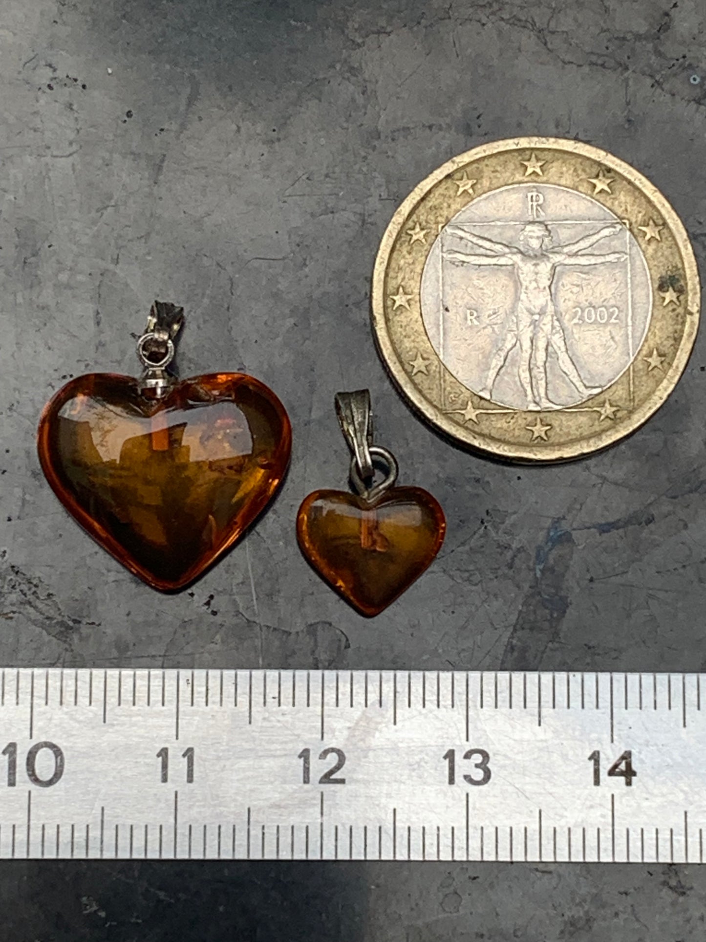 Amber, heart-shaped pendant, 2 sizes to choose from: 16x18x6 or 10x10x5 millimeters, sold with a sliding (adjustable) black leather cord from 40 to 70 centimeters!