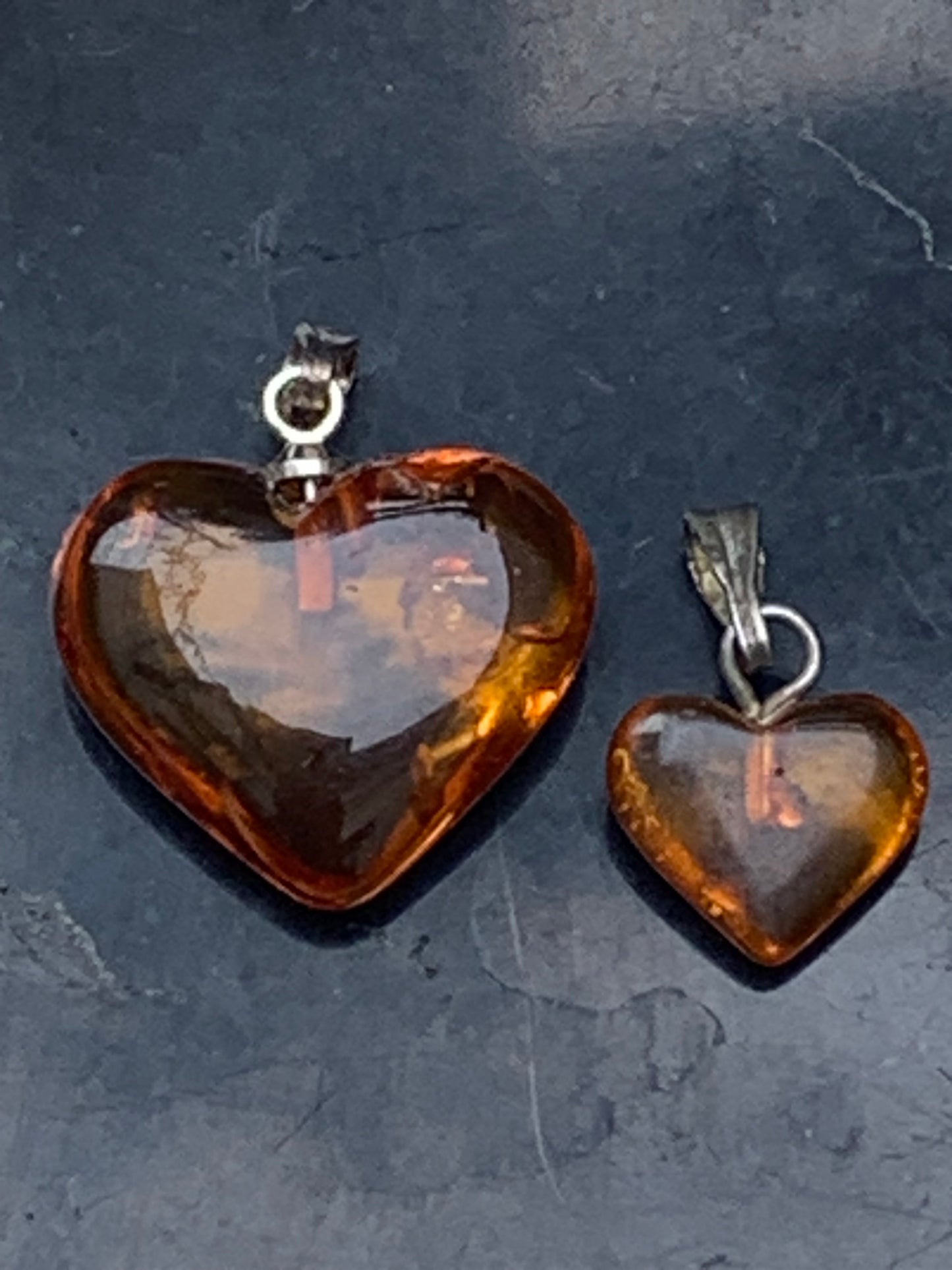 Amber, heart-shaped pendant, 2 sizes to choose from: 16x18x6 or 10x10x5 millimeters, sold with a sliding (adjustable) black leather cord from 40 to 70 centimeters!