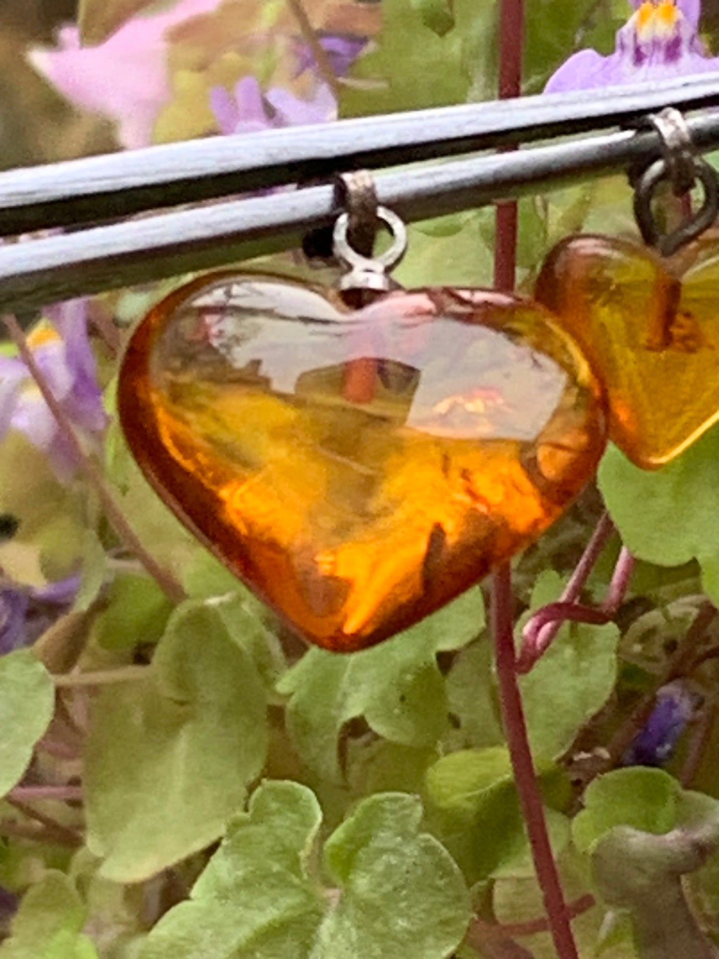 Amber, heart-shaped pendant, 2 sizes to choose from: 16x18x6 or 10x10x5 millimeters, sold with a sliding (adjustable) black leather cord from 40 to 70 centimeters!
