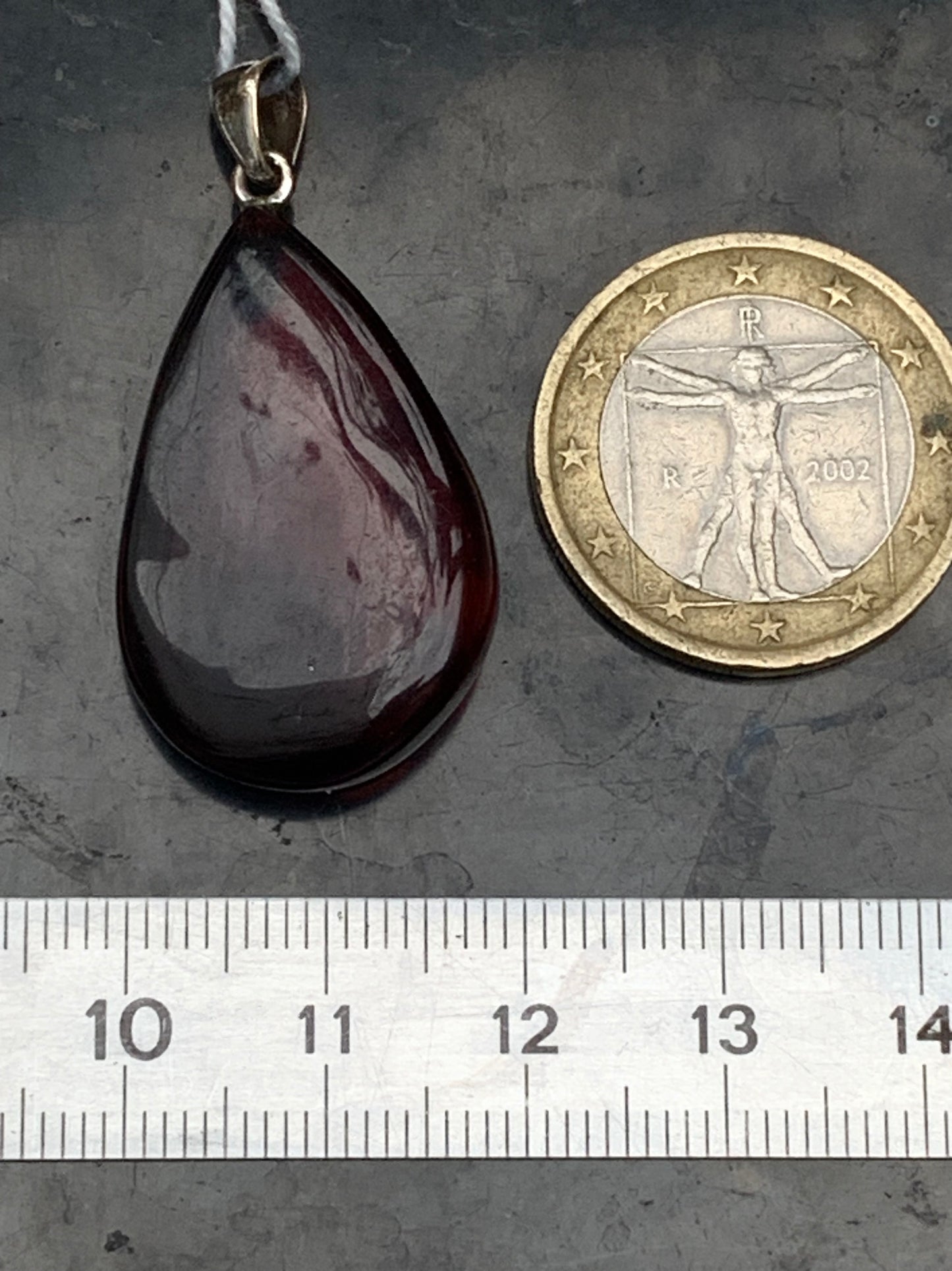 Amber, pendant measuring 40x20x10 millimeters, sold with a sliding (adjustable) black leather cord from 40 to 70 centimeters!
