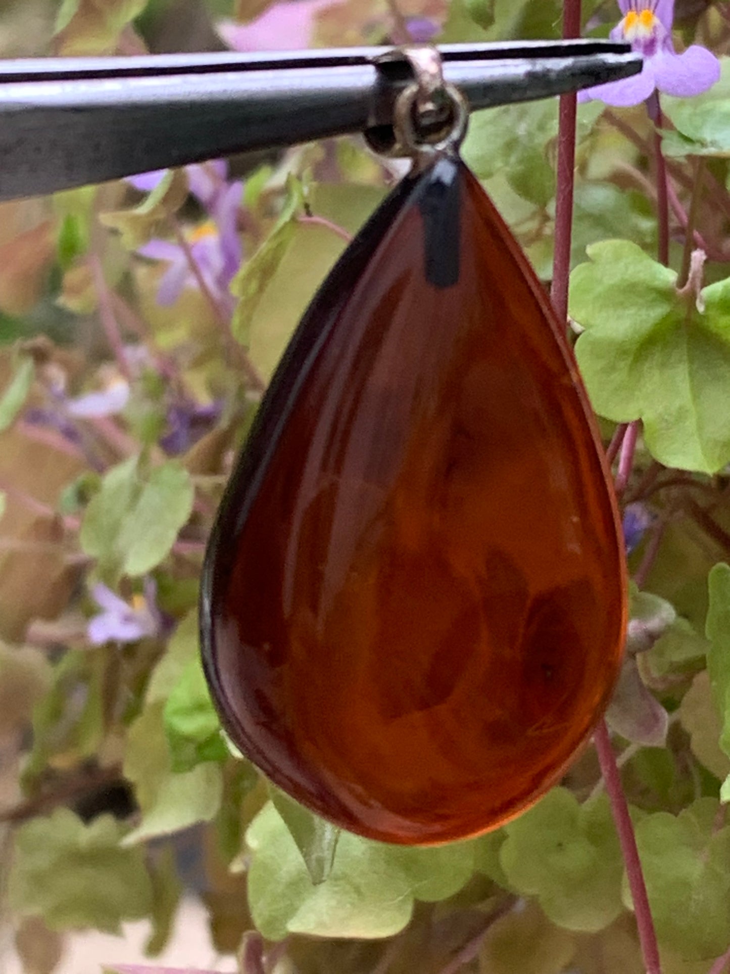 Amber, pendant measuring 40x20x10 millimeters, sold with a sliding (adjustable) black leather cord from 40 to 70 centimeters!