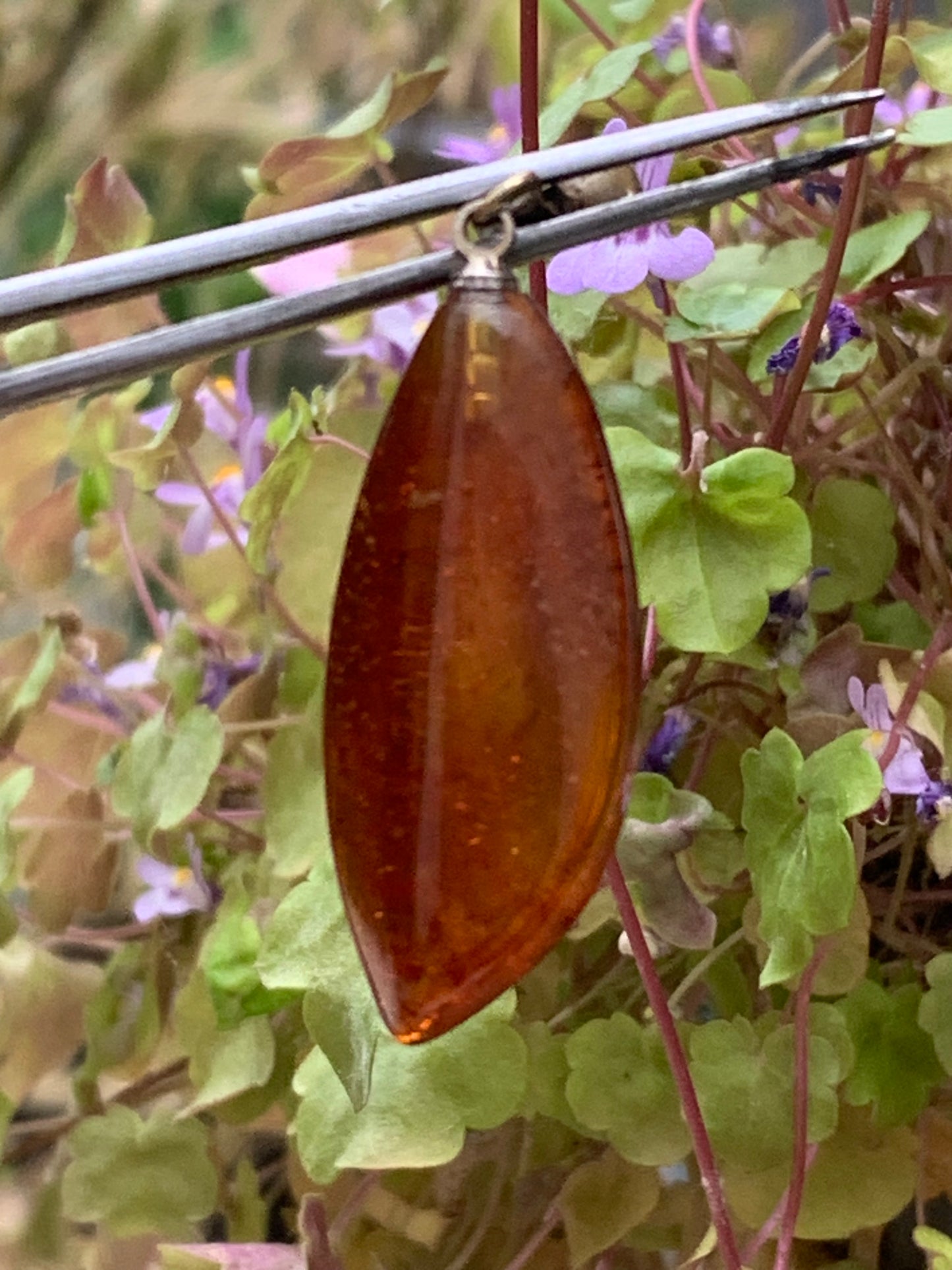 Amber, pendant measuring 40x13x9 millimeters, sold with a sliding (adjustable) black leather cord from 40 to 70 centimeters!
