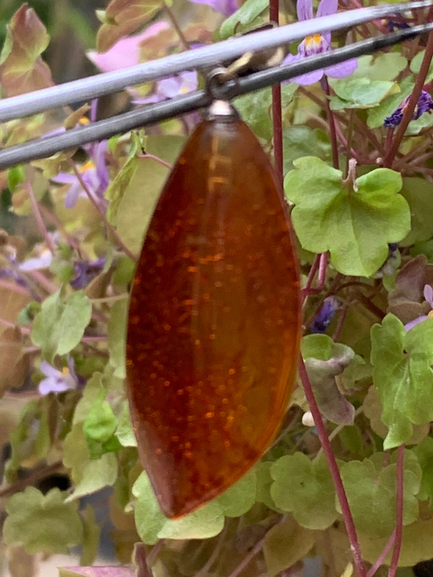 Amber, pendant measuring 40x13x9 millimeters, sold with a sliding (adjustable) black leather cord from 40 to 70 centimeters!