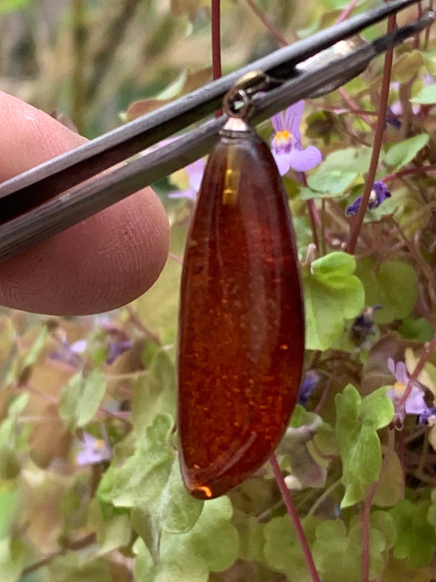 Amber, pendant measuring 40x13x9 millimeters, sold with a sliding (adjustable) black leather cord from 40 to 70 centimeters!