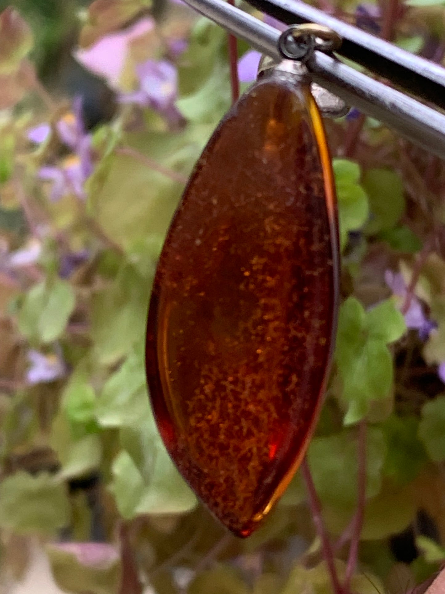 Amber, pendant measuring 40x13x9 millimeters, sold with a sliding (adjustable) black leather cord from 40 to 70 centimeters!