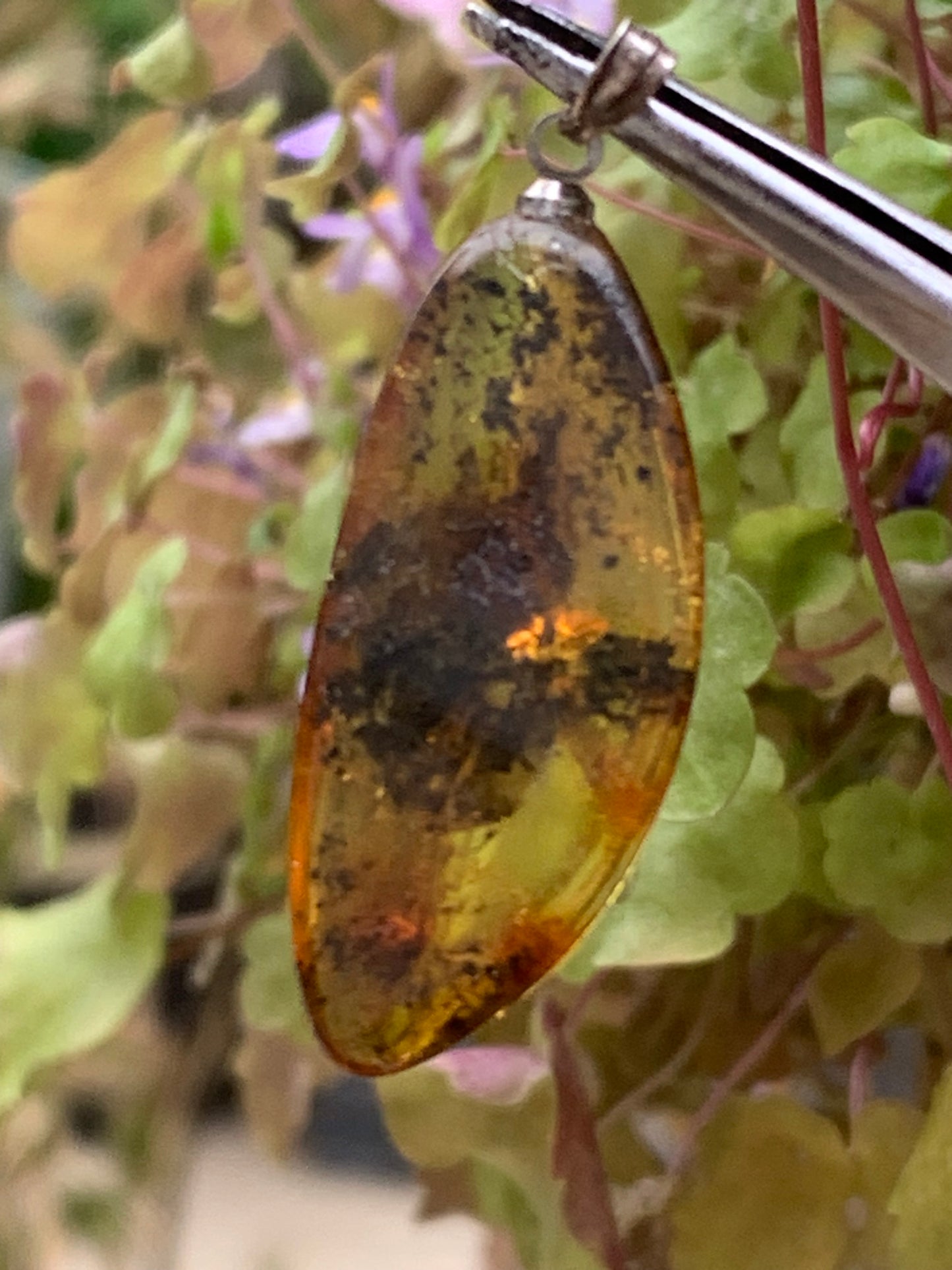 Amber, pendant measuring 40x13x9 millimeters, sold with a sliding (adjustable) black leather cord from 40 to 70 centimeters!