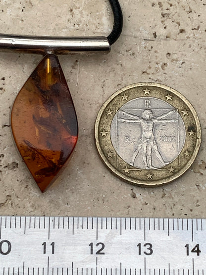 Amber, silver pendant, 35x15x10 millimeters, sold with a 42 centimeter black leather cord!