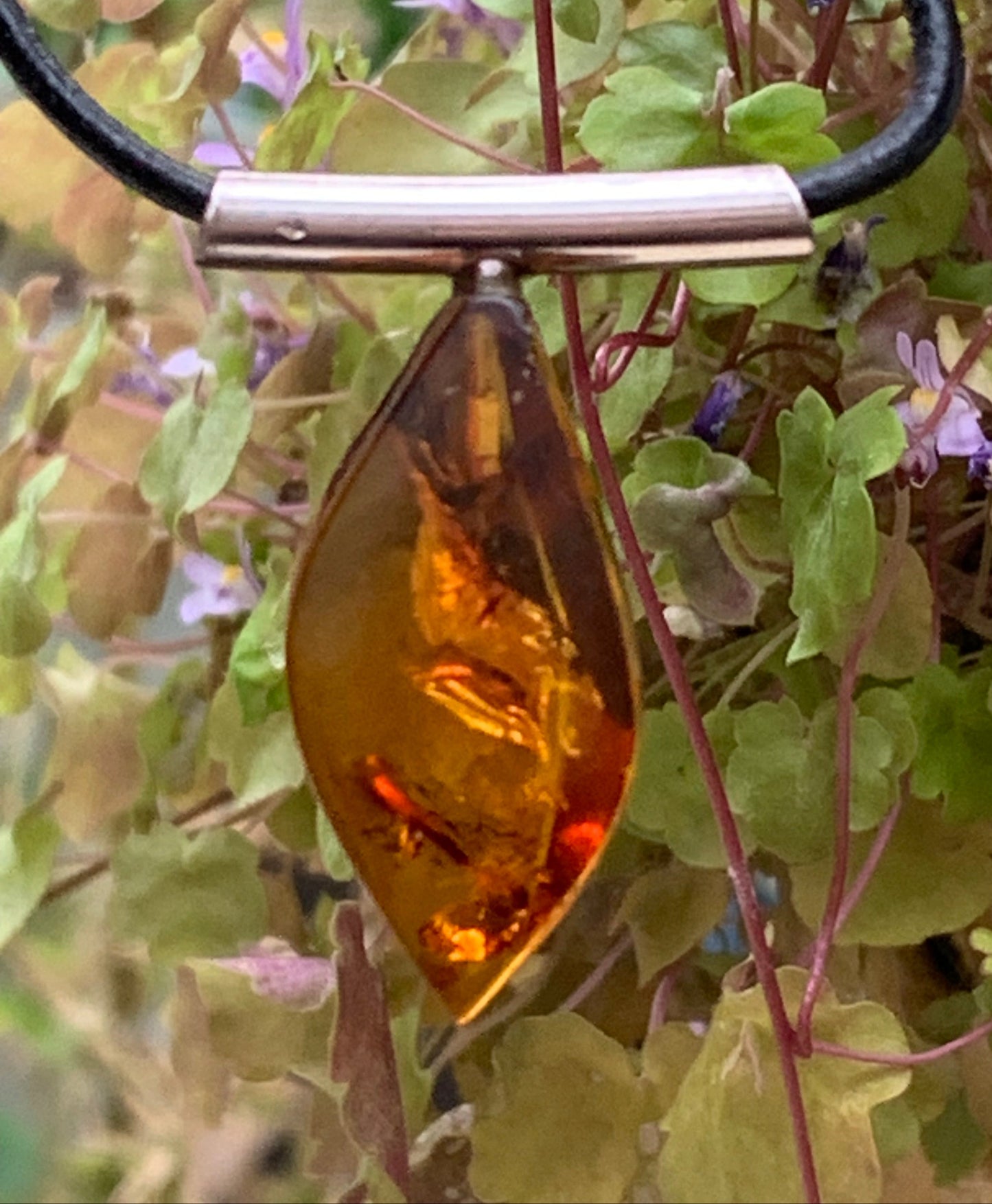Amber, silver pendant, 35x15x10 millimeters, sold with a 42 centimeter black leather cord!
