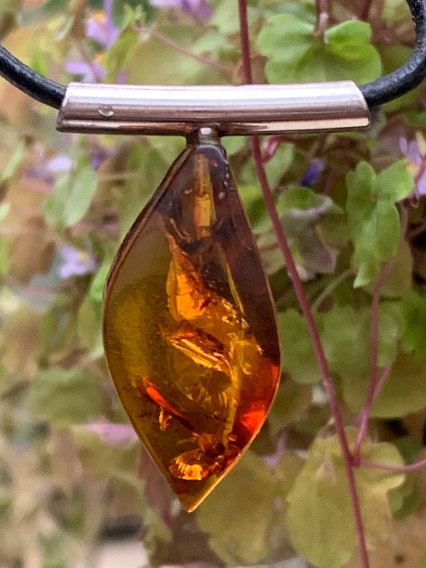 Amber, silver pendant, 35x15x10 millimeters, sold with a 42 centimeter black leather cord!