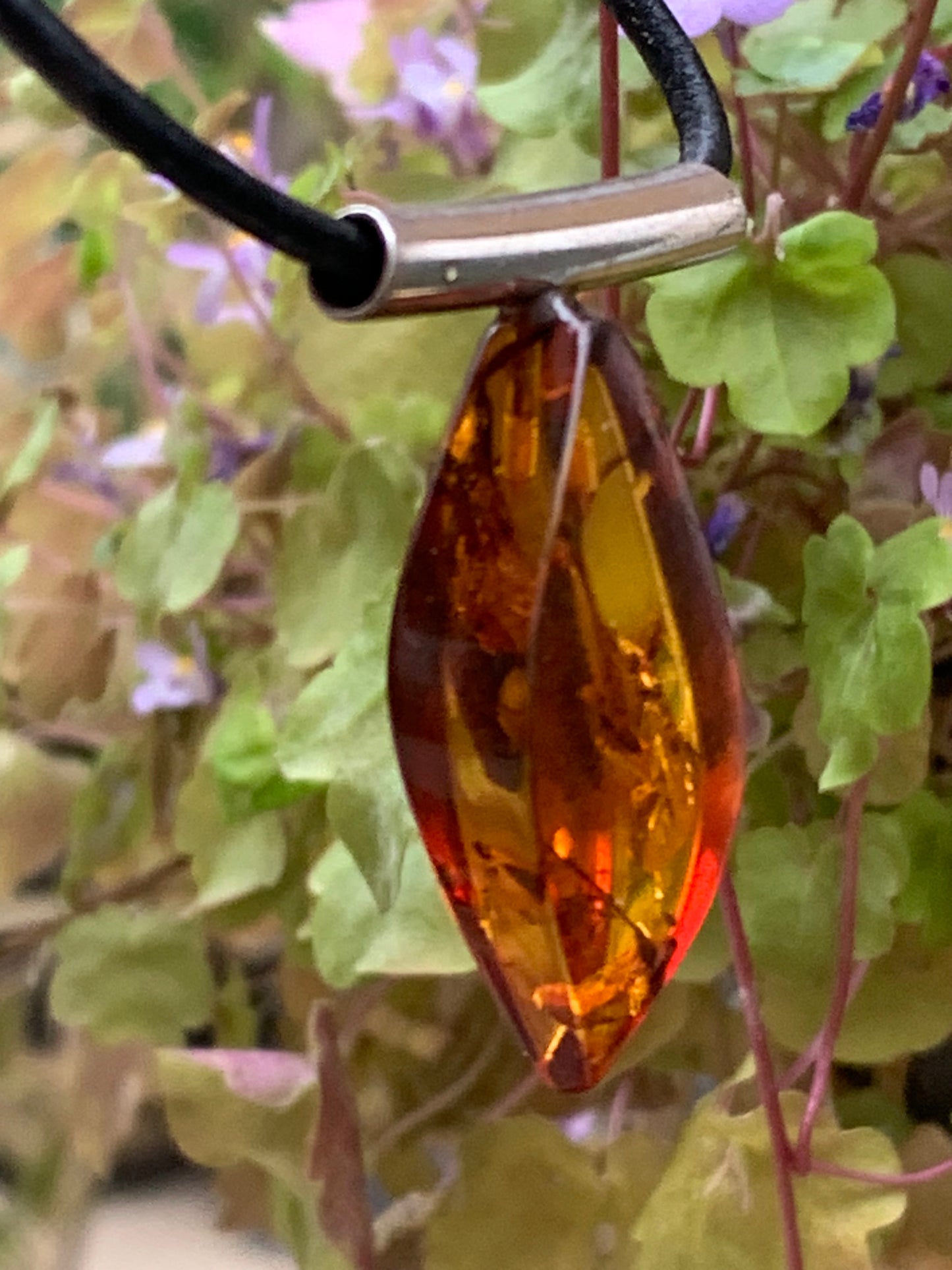 Amber, silver pendant, 35x15x10 millimeters, sold with a 42 centimeter black leather cord!