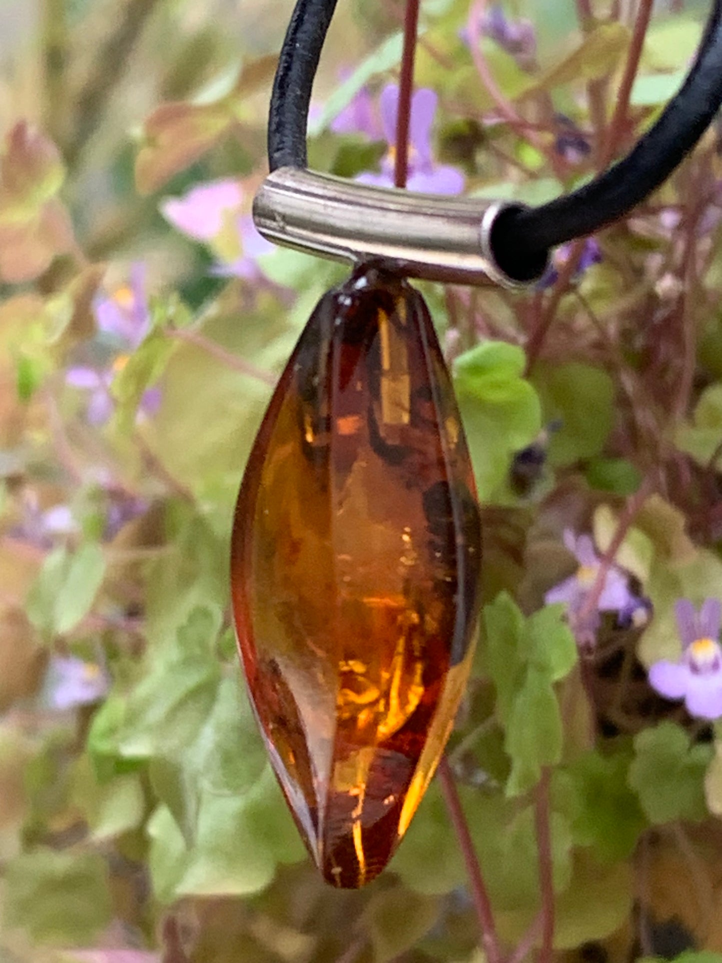 Amber, silver pendant, 35x15x10 millimeters, sold with a 42 centimeter black leather cord!