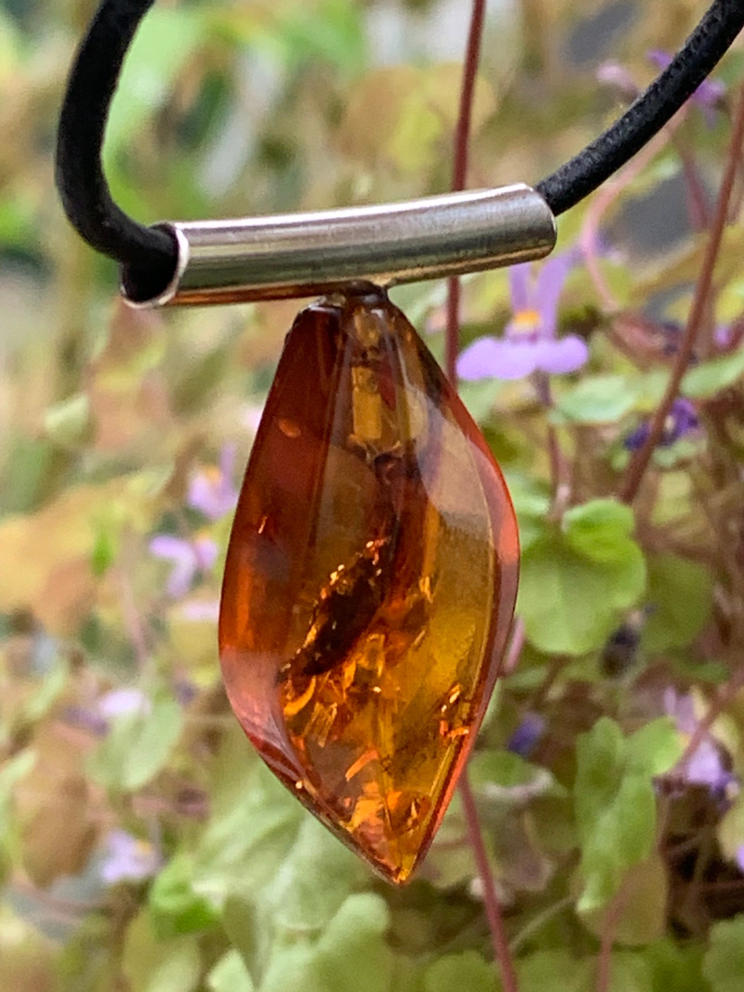 Amber, silver pendant, 35x15x10 millimeters, sold with a 42 centimeter black leather cord!