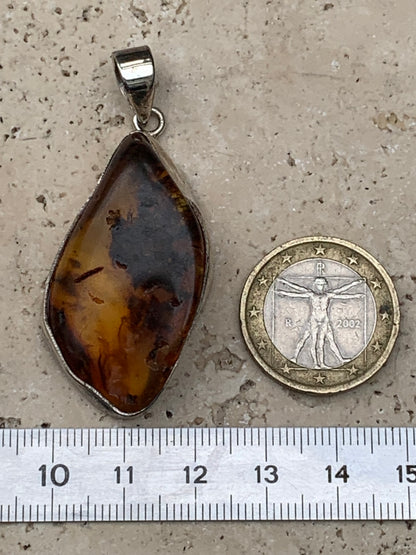 Amber, superb silver pendant measuring 55x22x12 mm. Sold with a sliding (adjustable) black leather cord from 40 to 70 cm!