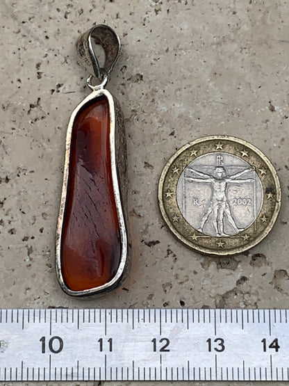 Amber, superb silver pendant measuring 50x15x7 mm. Sold with a sliding (adjustable) black leather cord measuring 40 to 70 cm!