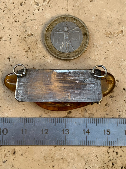 Amber, superb silver pendant measuring 55 x 20 x 10 millimeters! Superb pebble held by 3 claws in a horizontal position, made by G &amp; Z!