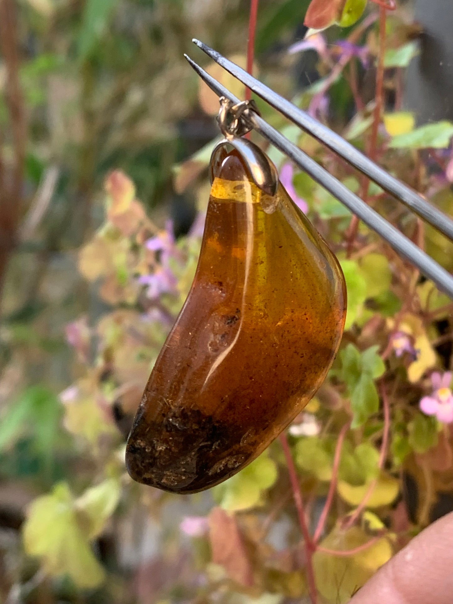 Amber, pendant, polished natural pebble measuring 47x22x10 millimeters, sold with a sliding (adjustable) black leather cord measuring 40 to 70 centimeters!