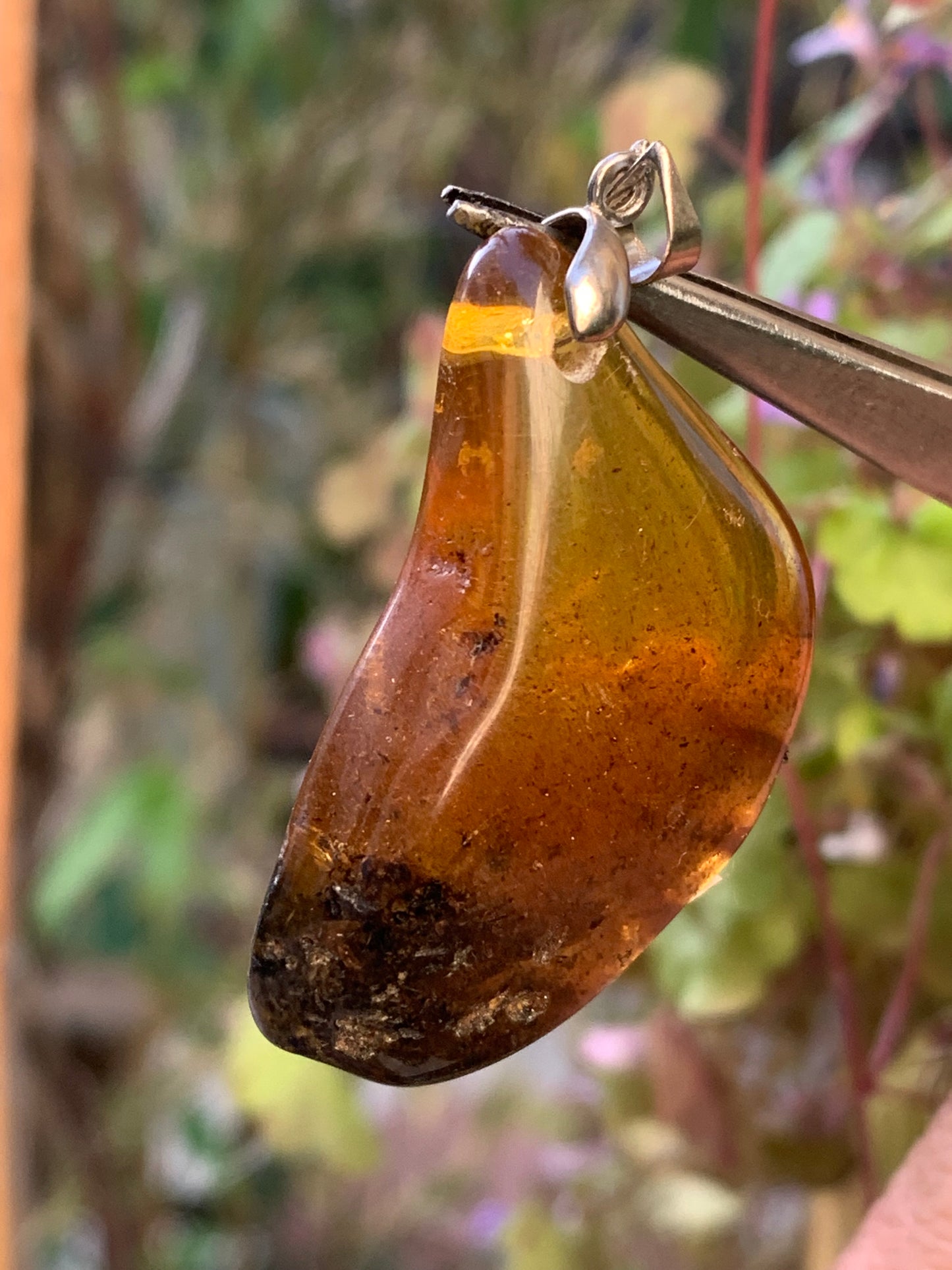 Amber, pendant, polished natural pebble measuring 47x22x10 millimeters, sold with a sliding (adjustable) black leather cord measuring 40 to 70 centimeters!