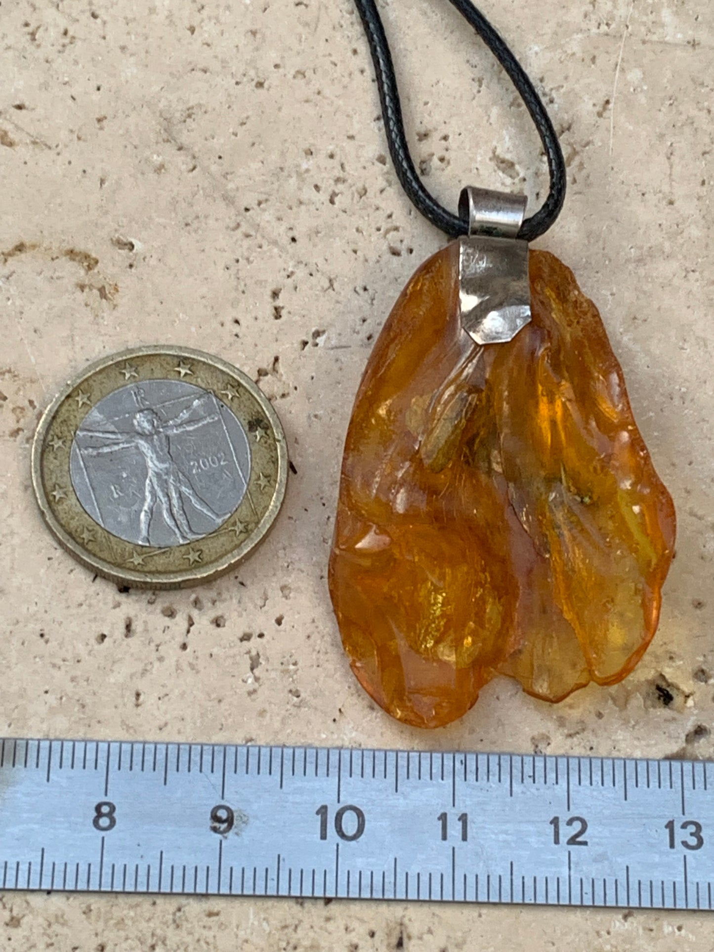 Amber, silver pendant, polished natural pebble measuring 52x30x10 millimeters, sold with a sliding (adjustable) black leather cord measuring 40 to 70 centimeters!