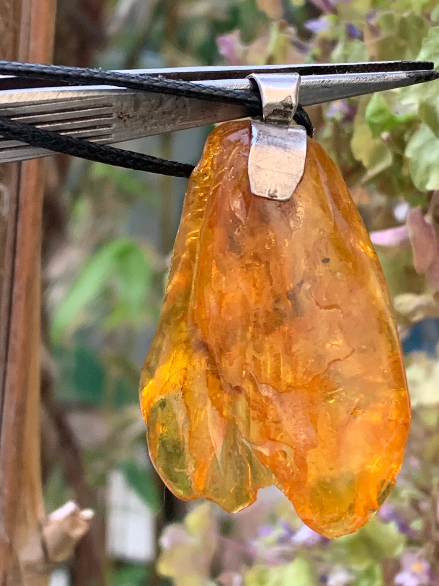 Amber, silver pendant, polished natural pebble measuring 52x30x10 millimeters, sold with a sliding (adjustable) black leather cord measuring 40 to 70 centimeters!