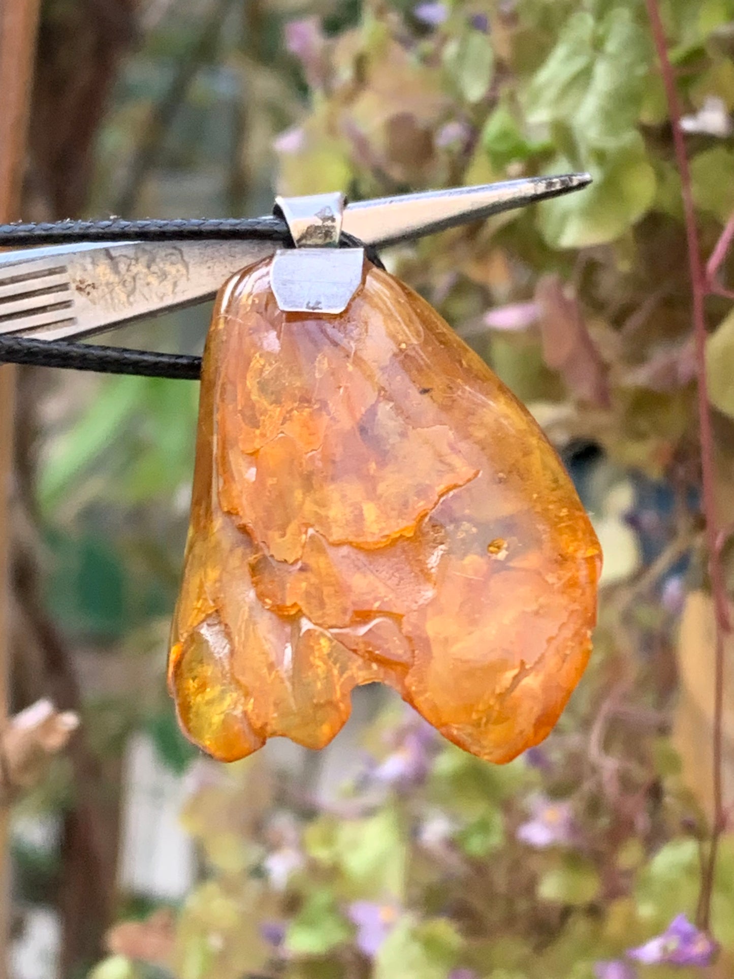 Amber, silver pendant, polished natural pebble measuring 52x30x10 millimeters, sold with a sliding (adjustable) black leather cord measuring 40 to 70 centimeters!