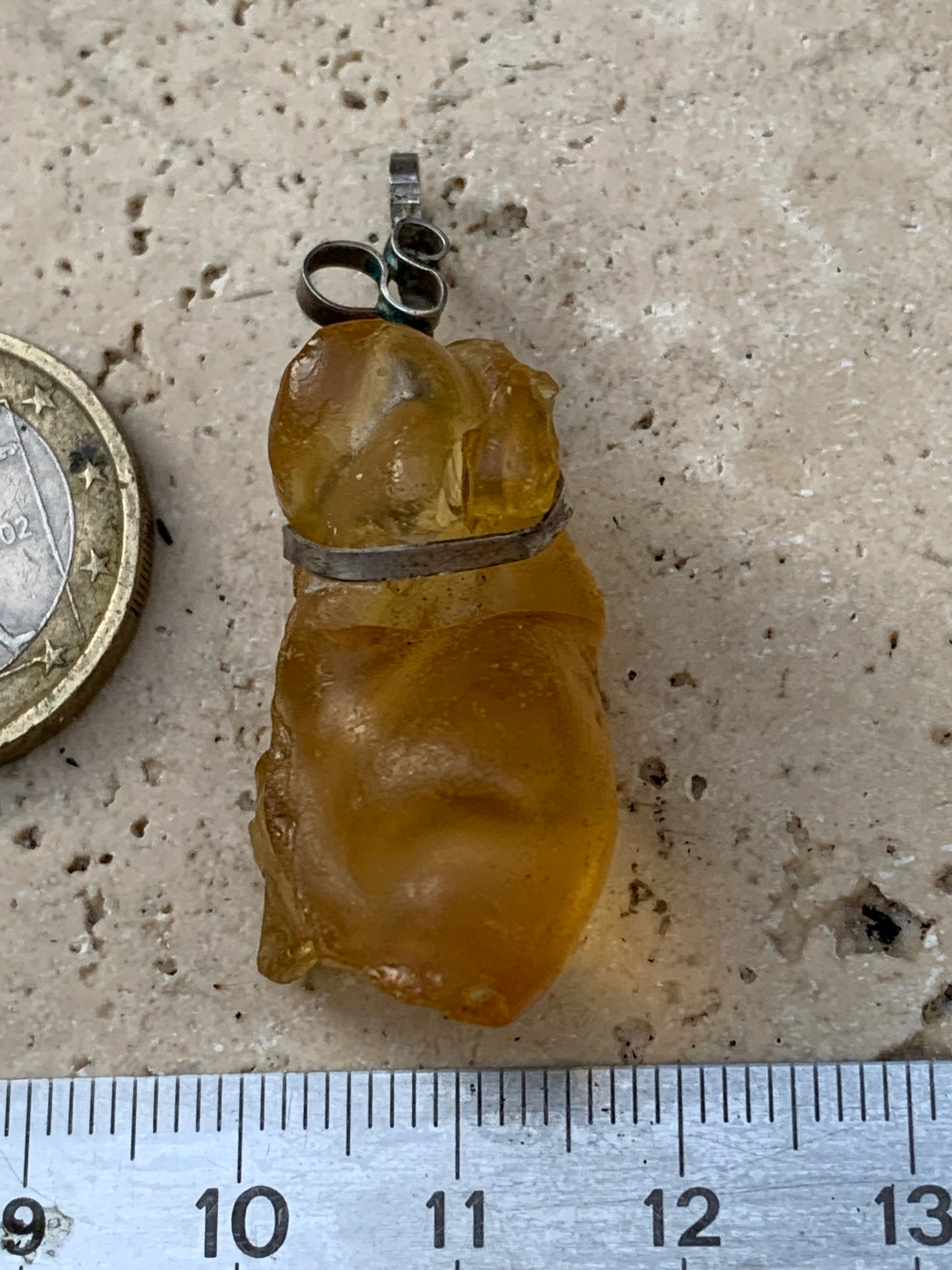 Amber, silver pendant measuring 45x15x15 millimeters, sold with a sliding (adjustable) black leather cord measuring 40 to 70 centimeters!