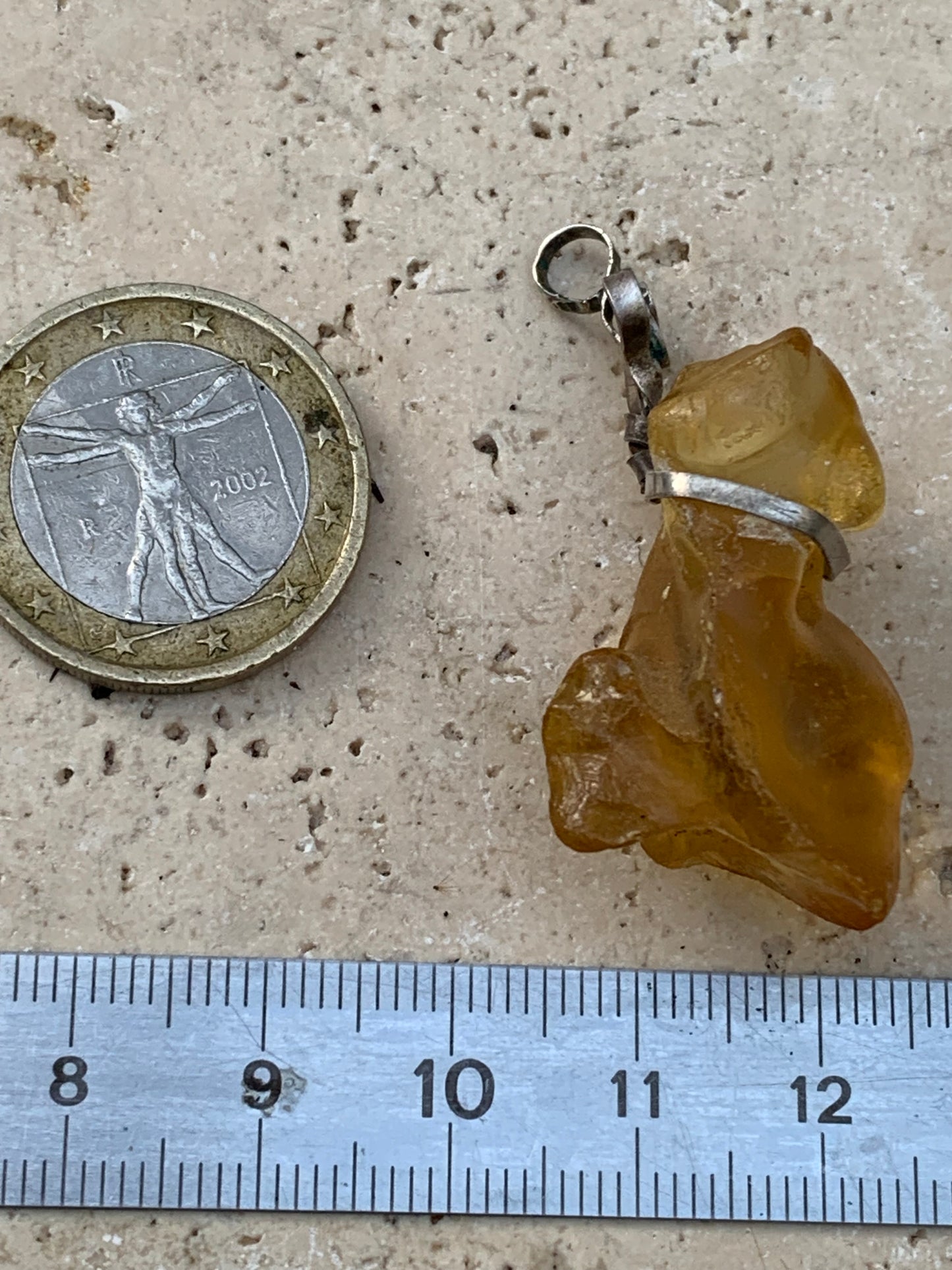Amber, silver pendant measuring 45x15x15 millimeters, sold with a sliding (adjustable) black leather cord measuring 40 to 70 centimeters!