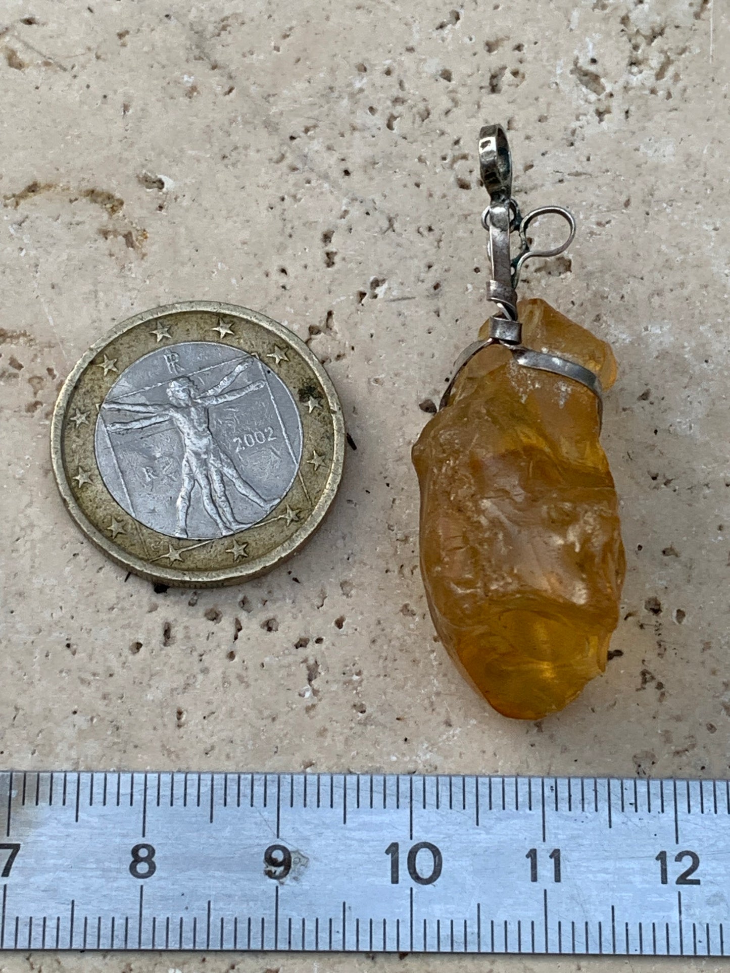Amber, silver pendant measuring 45x15x15 millimeters, sold with a sliding (adjustable) black leather cord measuring 40 to 70 centimeters!
