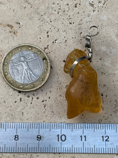 Amber, silver pendant measuring 45x15x15 millimeters, sold with a sliding (adjustable) black leather cord measuring 40 to 70 centimeters!
