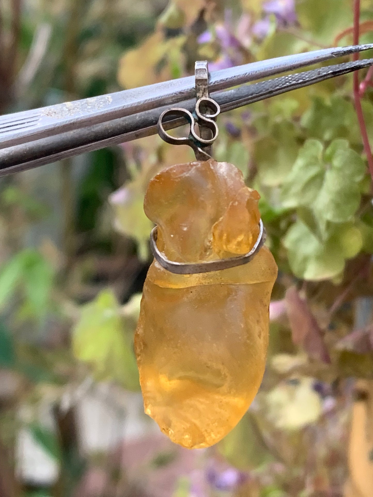 Amber, silver pendant measuring 45x15x15 millimeters, sold with a sliding (adjustable) black leather cord measuring 40 to 70 centimeters!