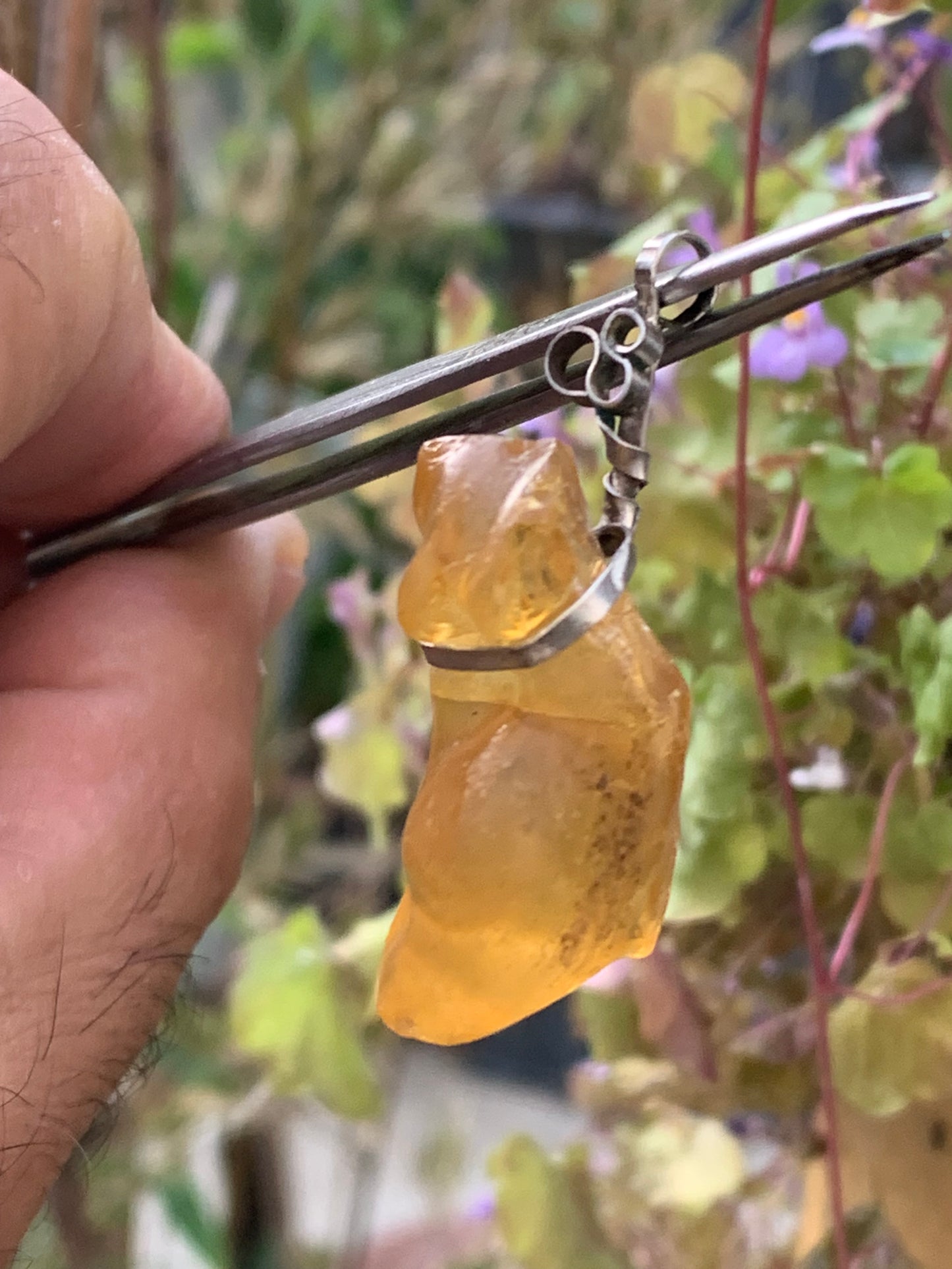 Amber, silver pendant measuring 45x15x15 millimeters, sold with a sliding (adjustable) black leather cord measuring 40 to 70 centimeters!