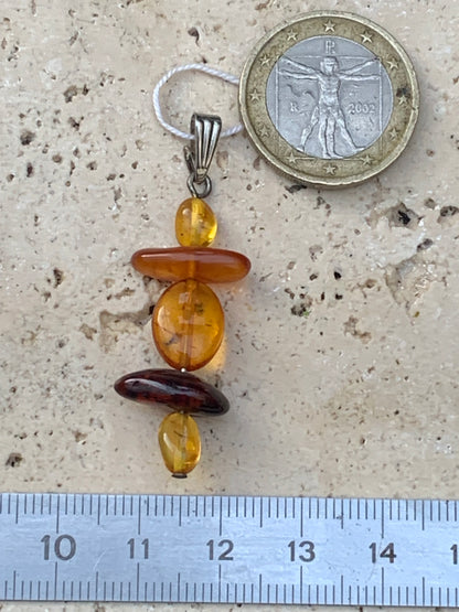 Amber, pendant made by G &amp; Z of 45x15x9 millimeters, sold with sliding cord (adjustable), in black leather from 40 to 70 centimeters!