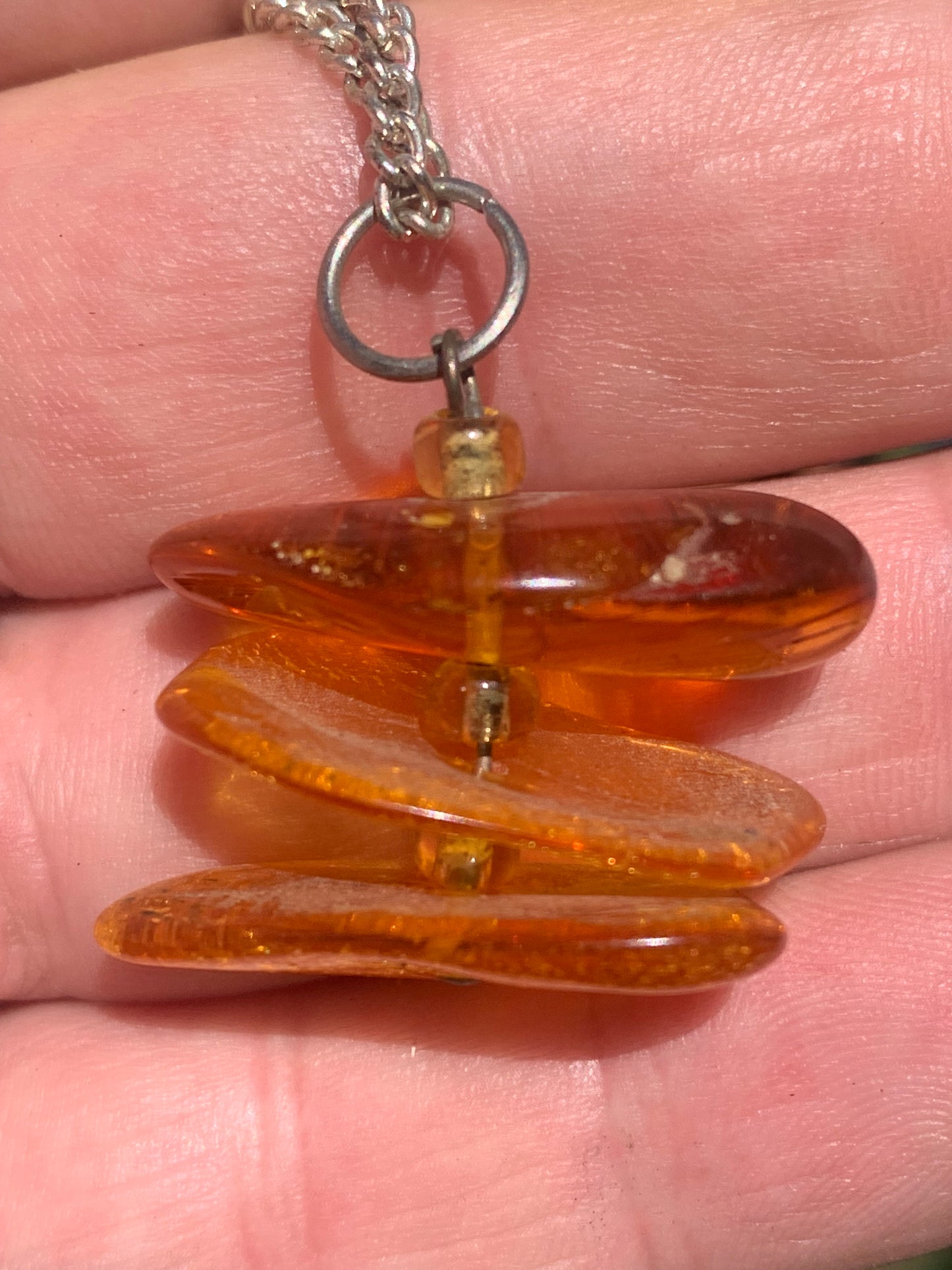 Amber, pendant of 3 polished natural pebbles measuring 32x30x15 millimeters, sold with a sliding cord (adjustable), in black leather from 40 to 70 centimeters!