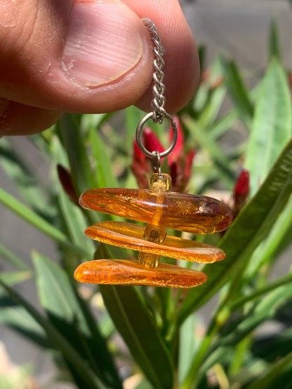 Amber, pendant of 3 polished natural pebbles measuring 32x30x15 millimeters, sold with a sliding cord (adjustable), in black leather from 40 to 70 centimeters!
