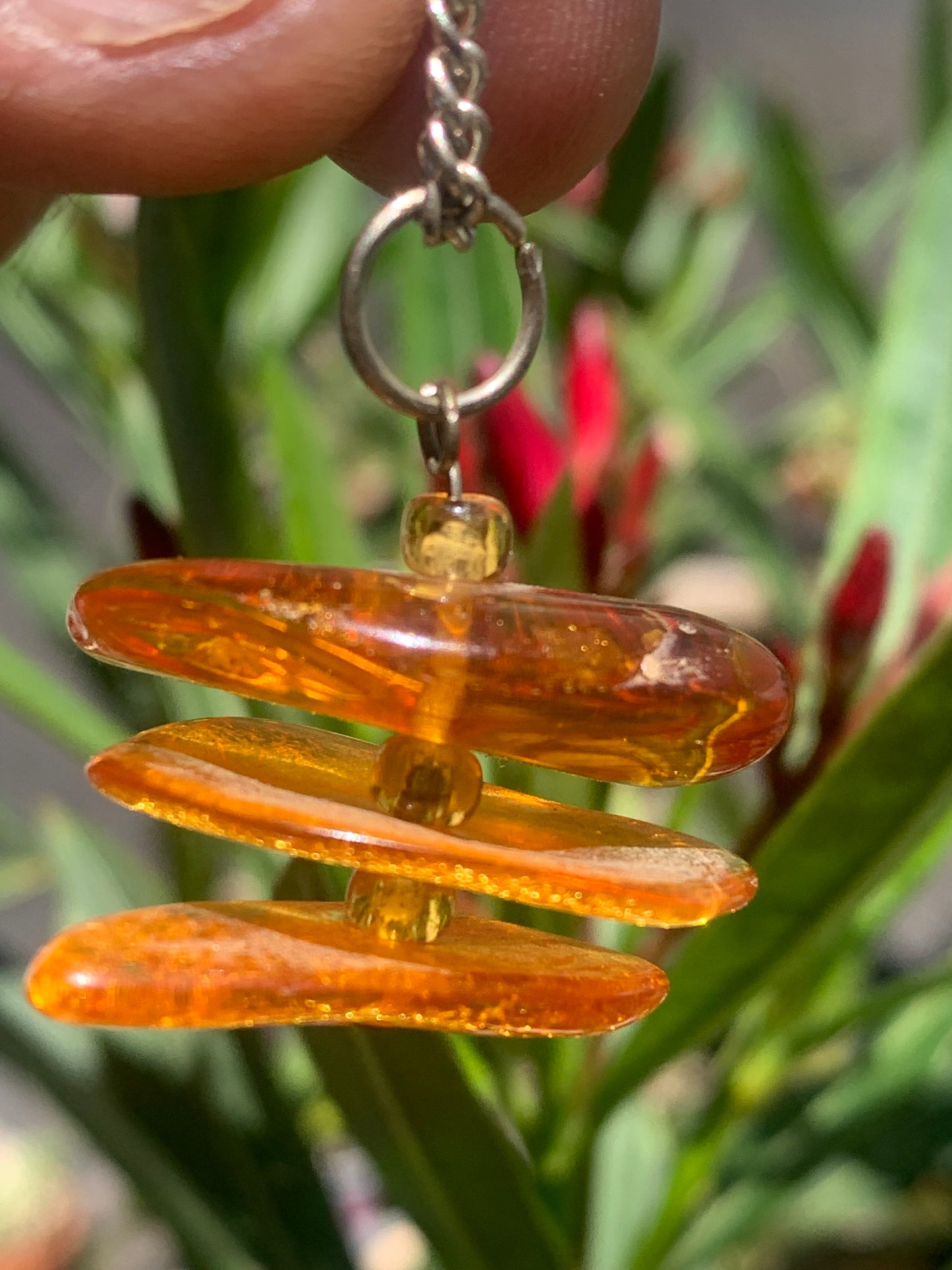 Amber, pendant of 3 polished natural pebbles measuring 32x30x15 millimeters, sold with a sliding cord (adjustable), in black leather from 40 to 70 centimeters!