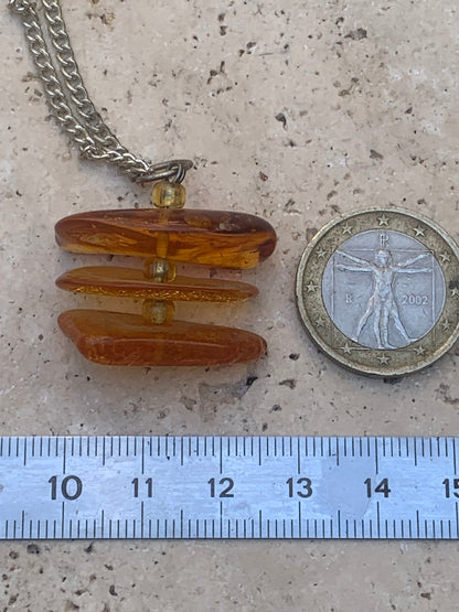 Amber, pendant of 3 polished natural pebbles measuring 32x30x15 millimeters, sold with a sliding cord (adjustable), in black leather from 40 to 70 centimeters!