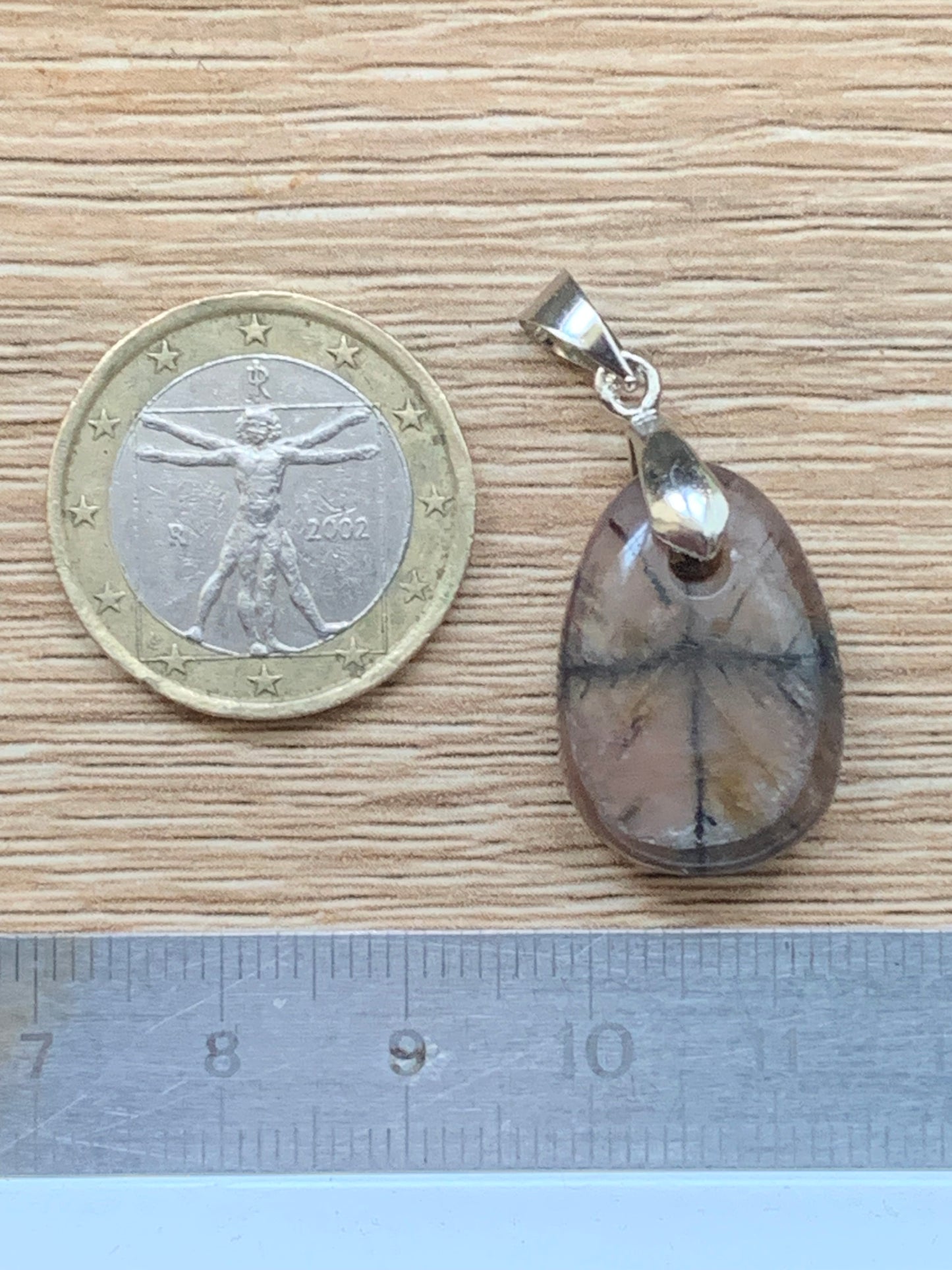 Chiastolite/Andalusite, pendant measuring 33 millimeters x 18x7. Sold with or without a black cord and adjustable to 60 cm!