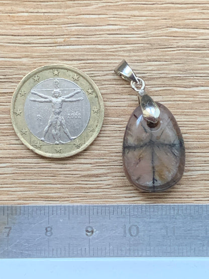 Chiastolite/Andalusite, pendant measuring 33 millimeters x 18x7. Sold with or without a black cord and adjustable to 60 cm!